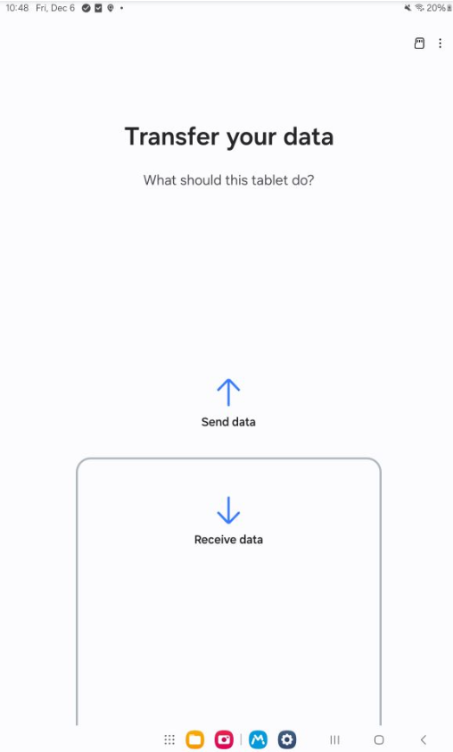 An image showing the Smart Switch app running on a device screen, displaying two options: 'Send Data' and 'Receive Data' for transferring data between devices.